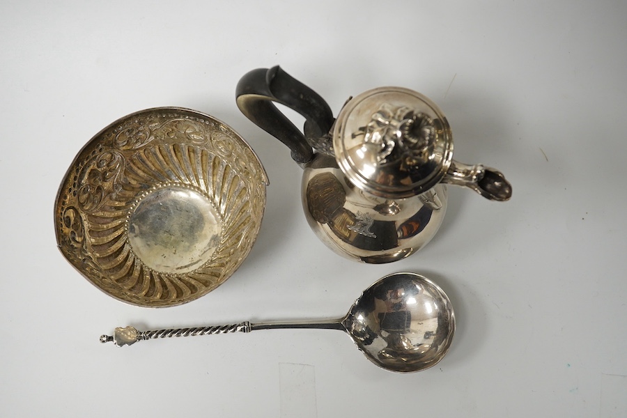 A small French white metal hot water pot, 13cm, a continental white metal bowl (a.f.) and a 19th century German white metal spoon. Condition - poor to fair